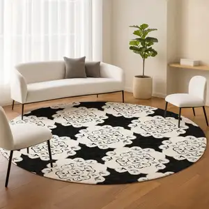 Photo of 8' Black And Ivory Round Quatrefoil Washable Indoor Outdoor Area Rug