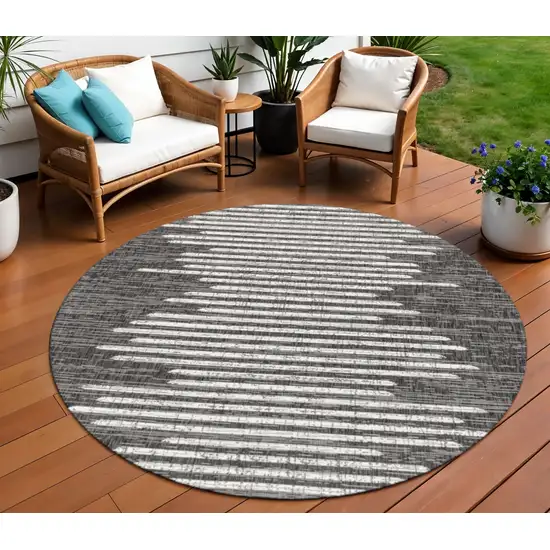 8' Black And Ivory Round Striped Indoor Outdoor Area Rug Photo 1