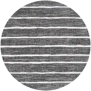 Photo of 5' Black And Ivory Round Striped Indoor Outdoor Area Rug
