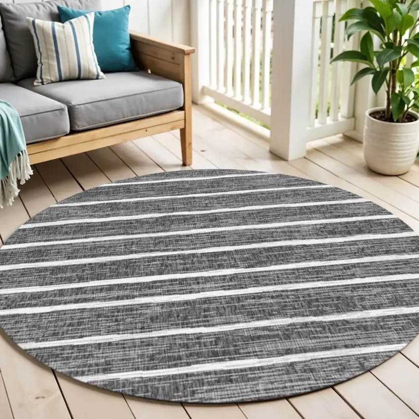 5' Black And Ivory Round Striped Indoor Outdoor Area Rug Photo 1