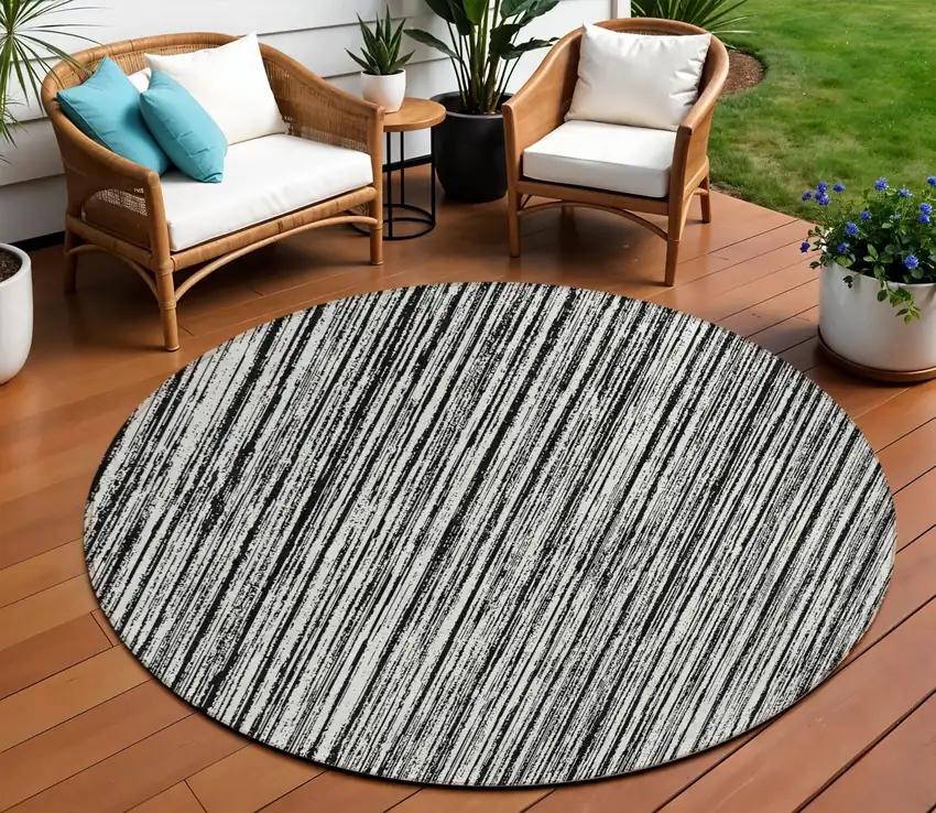 8' Black And Ivory Round Striped Washable Indoor Outdoor Area Rug Photo 1