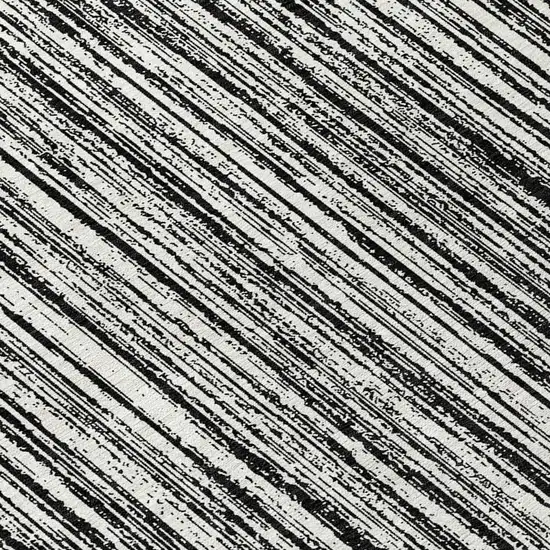8' Black And Ivory Round Striped Washable Indoor Outdoor Area Rug Photo 9