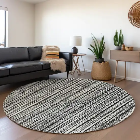 8' Black And Ivory Round Striped Washable Indoor Outdoor Area Rug Photo 7