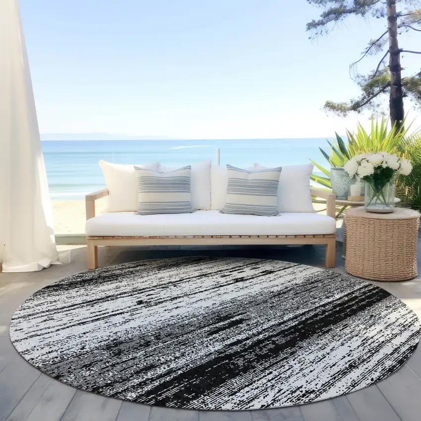 8' Black And Ivory Round Striped Washable Indoor Outdoor Area Rug Photo 6