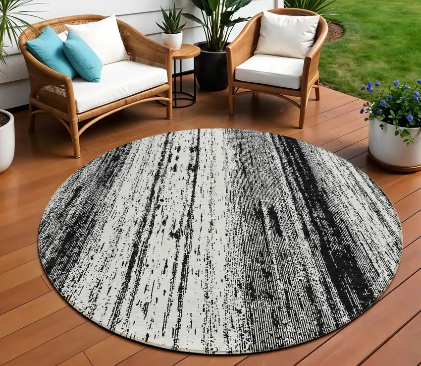 8' Black And Ivory Round Striped Washable Indoor Outdoor Area Rug Photo 1