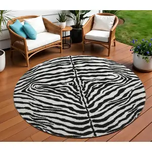 Photo of 8' Black And Ivory Round Zebra Print Washable Indoor Outdoor Area Rug