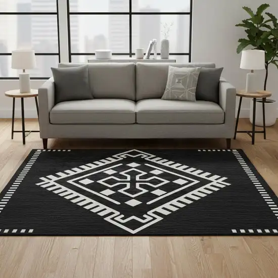 8' Black And Ivory Southwestern Washable Round Rug With UV Protection Photo 2
