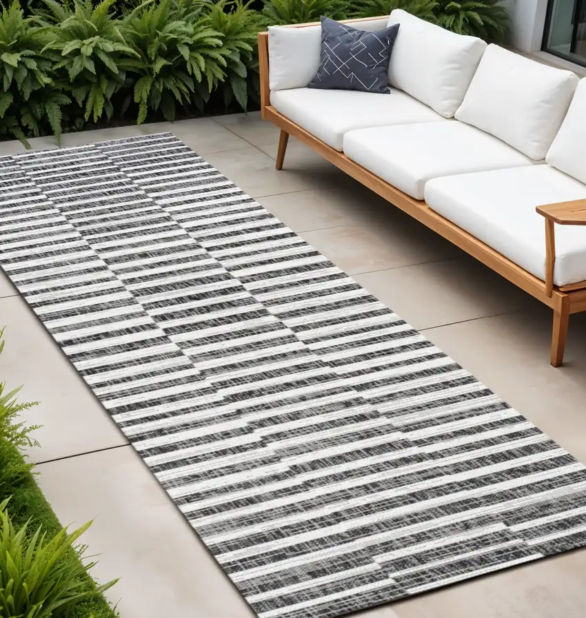 10' Black And Ivory Striped Indoor Outdoor Runner Rug Photo 1