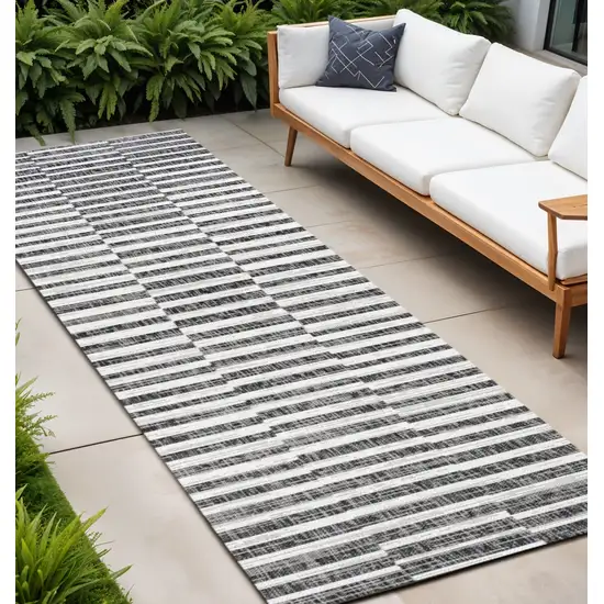 8' Black And Ivory Striped Indoor Outdoor Runner Rug Photo 1