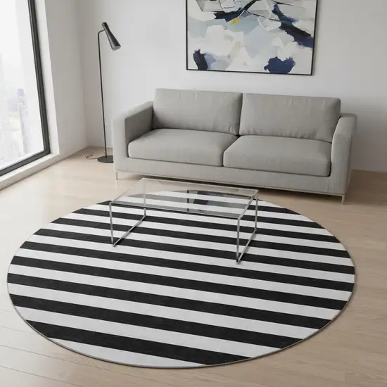 8' Black And Ivory Striped Washable Round Rug With UV Protection Photo 2