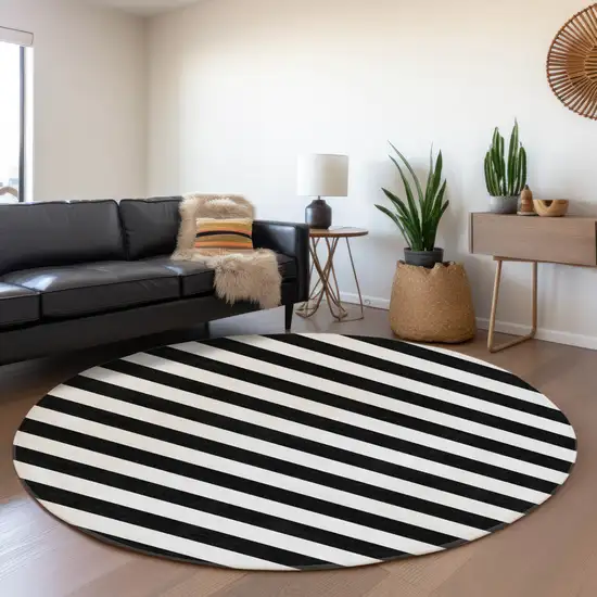 8' Black And Ivory Striped Washable Round Rug With UV Protection Photo 5