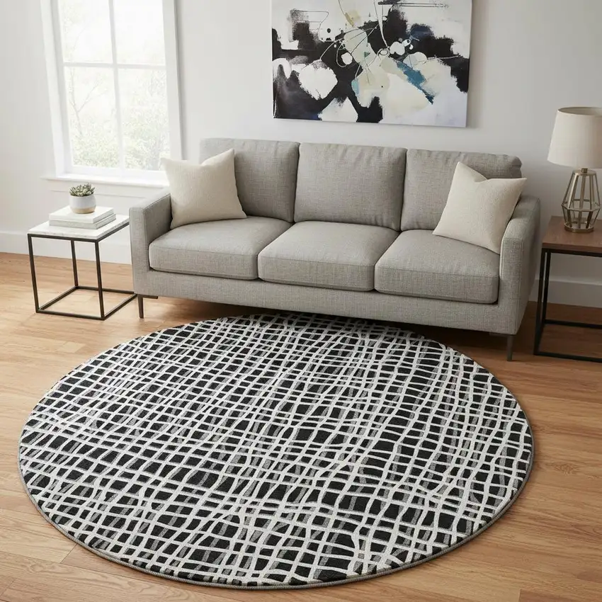 8' Black And Ivory Striped Washable Round Rug With UV Protection Photo 2