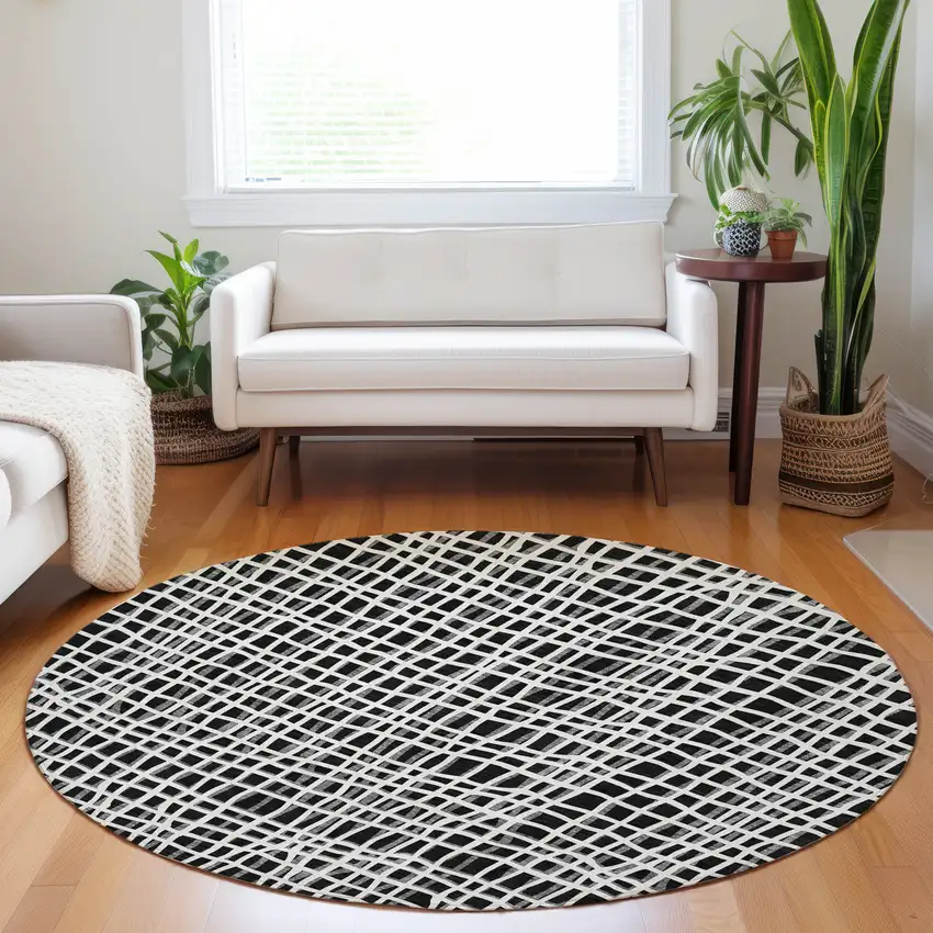 8' Black And Ivory Striped Washable Round Rug With UV Protection Photo 5