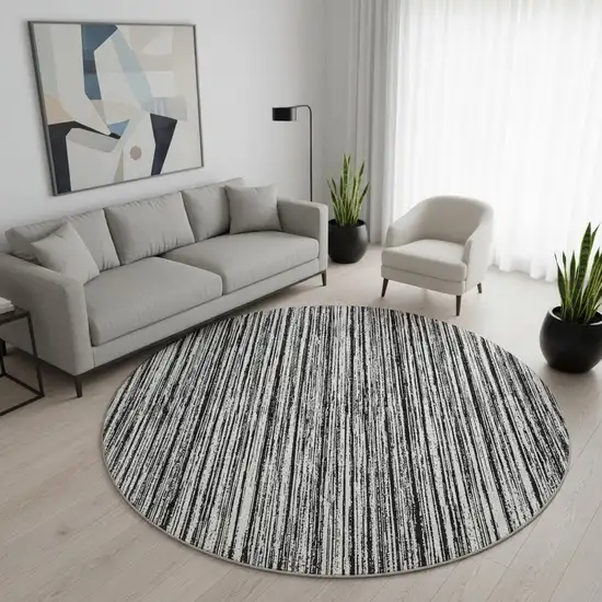 8' Black And Ivory Striped Washable Round Rug With UV Protection Photo 2