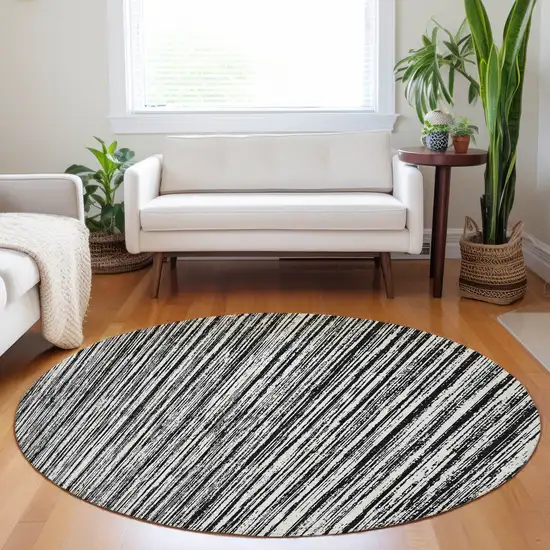 8' Black And Ivory Striped Washable Round Rug With UV Protection Photo 5