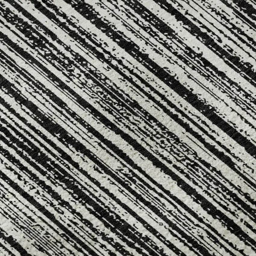 8' Black And Ivory Striped Washable Round Rug With UV Protection Photo 9