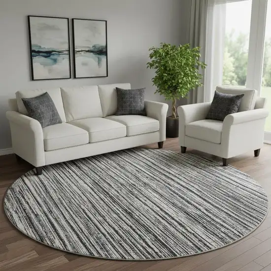 8' Black And Ivory Striped Washable Round Rug With UV Protection Photo 1