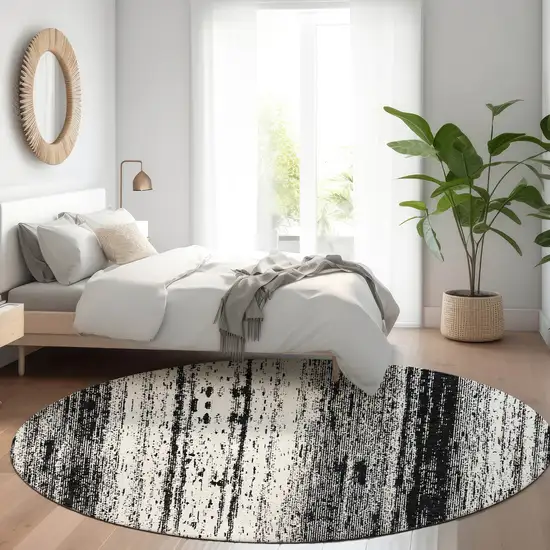 8' Black And Ivory Striped Washable Round Rug With UV Protection Photo 3