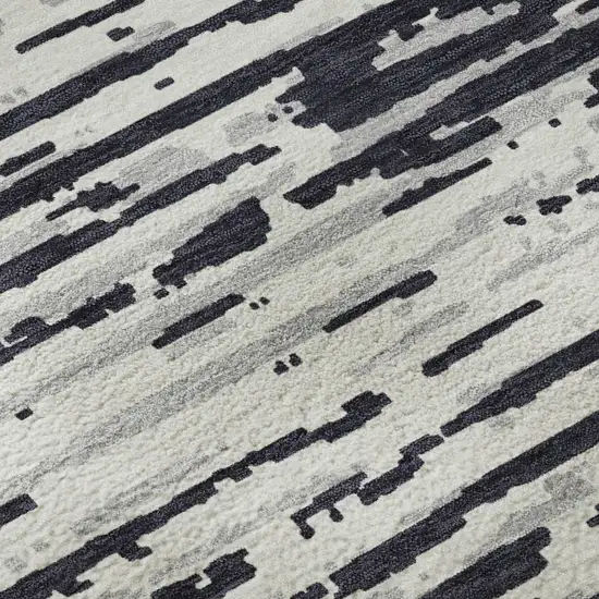 8' Black And Ivory Striped Washable Round Rug With UV Protection Photo 7