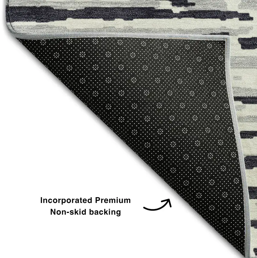 8' Black And Ivory Striped Washable Round Rug With UV Protection Photo 4