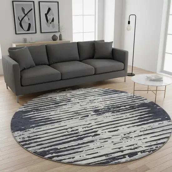8' Black And Ivory Striped Washable Round Rug With UV Protection Photo 2