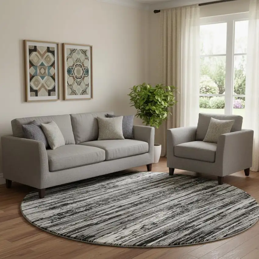 8' Black And Ivory Striped Washable Round Rug With UV Protection Photo 1