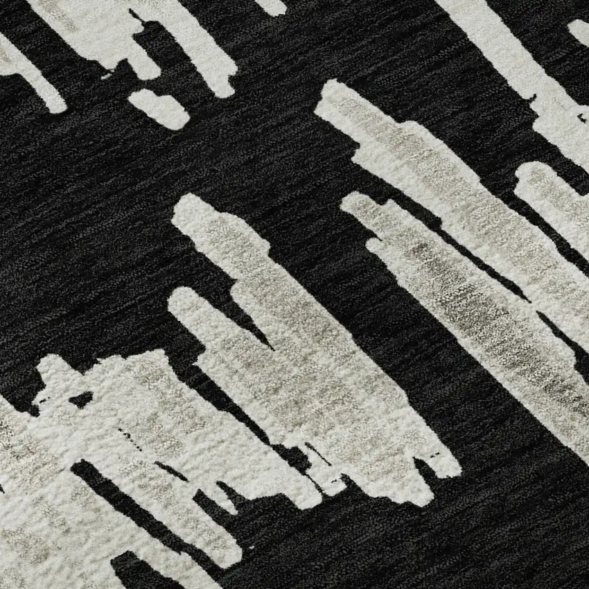 8' Black And Ivory Striped Washable Round Rug With UV Protection Photo 7