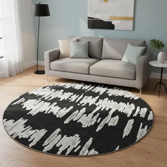 8' Black And Ivory Striped Washable Round Rug With UV Protection Photo 2