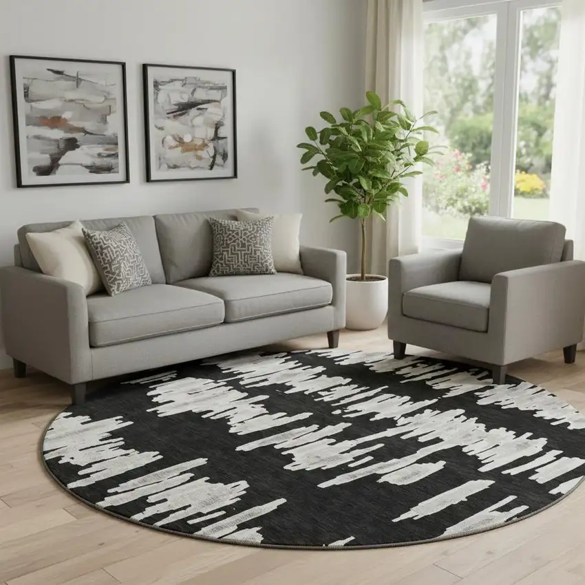 8' Black And Ivory Striped Washable Round Rug With UV Protection Photo 1