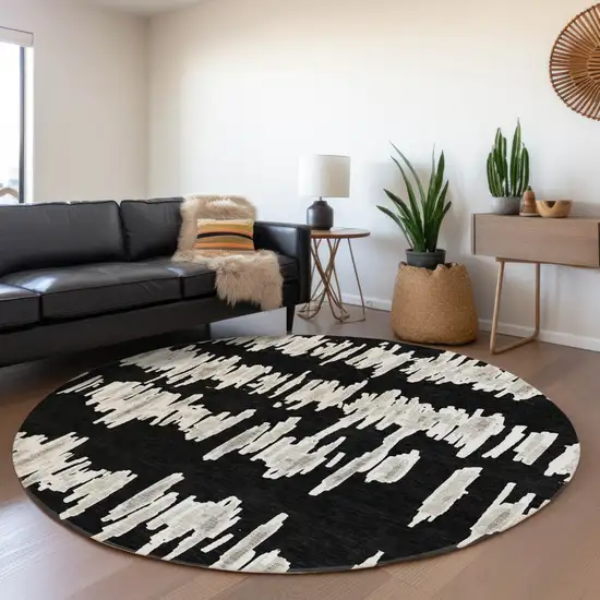 8' Black And Ivory Striped Washable Round Rug With UV Protection Photo 3