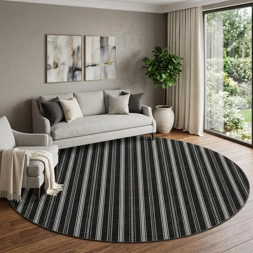 8' Black And Ivory Striped Washable Round Rug With UV Protection Photo 1