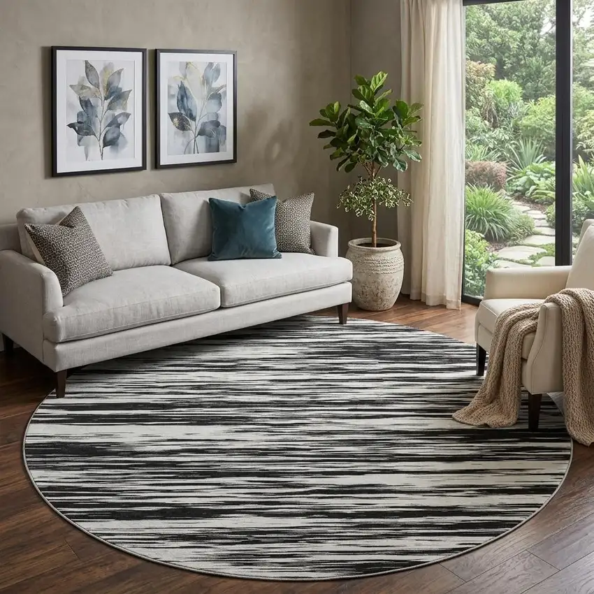8' Black And Ivory Striped Washable Round Rug With UV Protection Photo 1