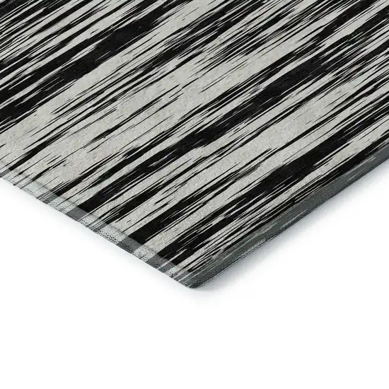 8' Black And Ivory Striped Washable Round Rug With UV Protection Photo 5