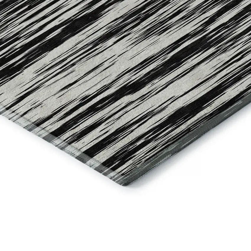 8' Black And Ivory Striped Washable Round Rug With UV Protection Photo 5