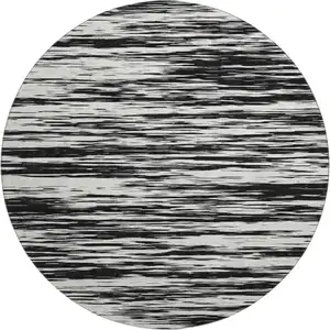 Photo of 8' Black And Ivory Striped Washable Round Rug With UV Protection