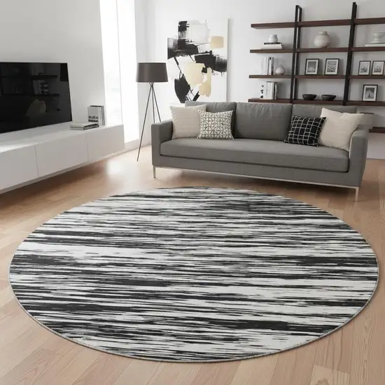 8' Black And Ivory Striped Washable Round Rug With UV Protection Photo 2