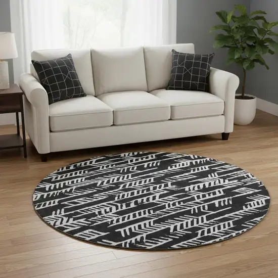 8' Black And Ivory Tribal Washable Round Rug With UV Protection Photo 2