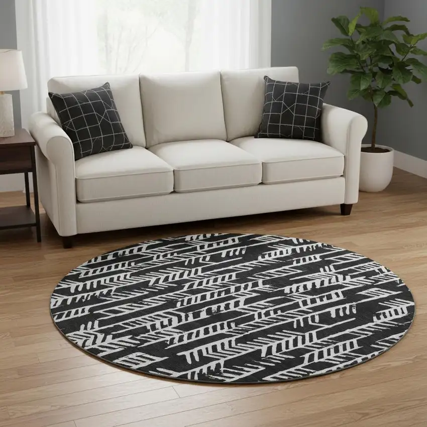8' Black And Ivory Tribal Washable Round Rug With UV Protection Photo 2