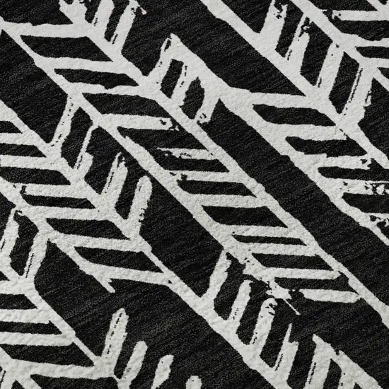 8' Black And Ivory Tribal Washable Round Rug With UV Protection Photo 9