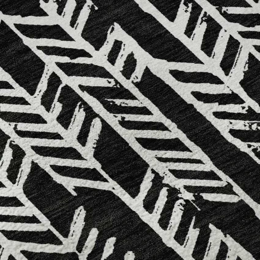 8' Black And Ivory Tribal Washable Round Rug With UV Protection Photo 9