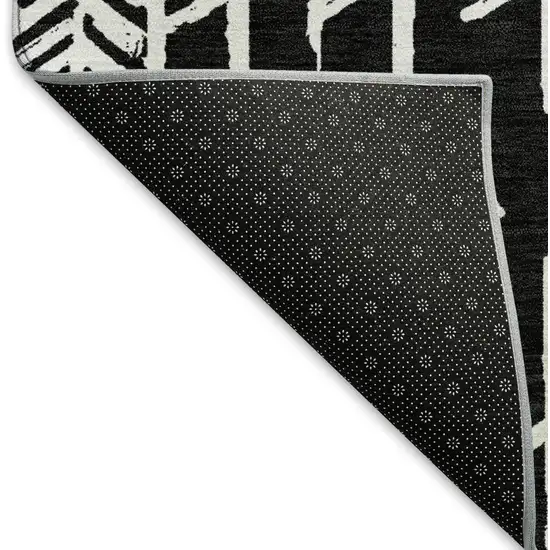 8' Black And Ivory Tribal Washable Round Rug With UV Protection Photo 6
