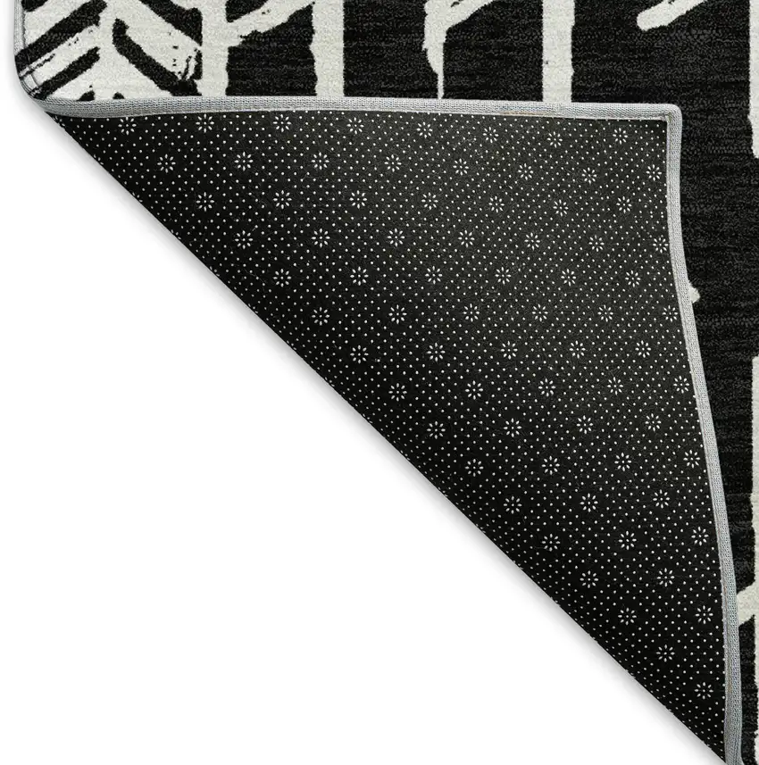 8' Black And Ivory Tribal Washable Round Rug With UV Protection Photo 6