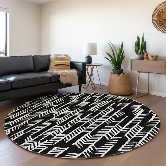 8' Black And Ivory Tribal Washable Round Rug With UV Protection Photo 5