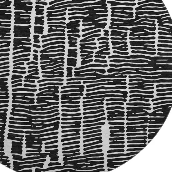 8' Black And Ivory Vermicular Washable Round Rug With UV Protection Photo 3