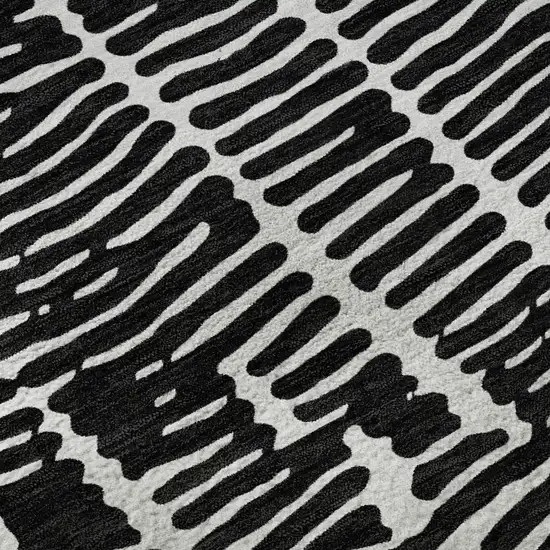 8' Black And Ivory Vermicular Washable Round Rug With UV Protection Photo 9