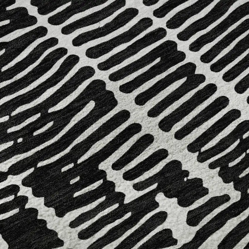 8' Black And Ivory Vermicular Washable Round Rug With UV Protection Photo 9