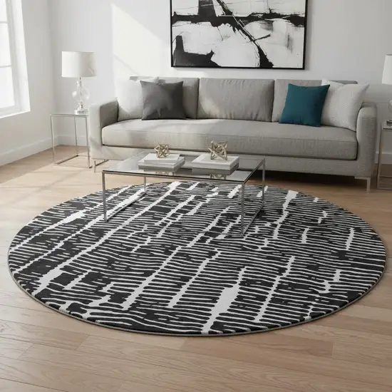 8' Black And Ivory Vermicular Washable Round Rug With UV Protection Photo 2