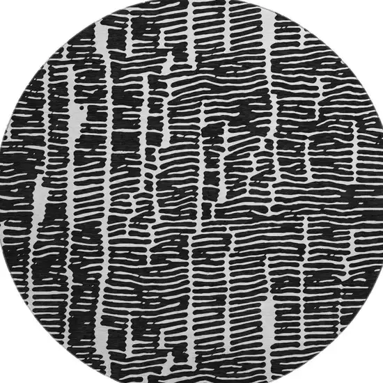 8' Black And Ivory Vermicular Washable Round Rug With UV Protection Photo 4