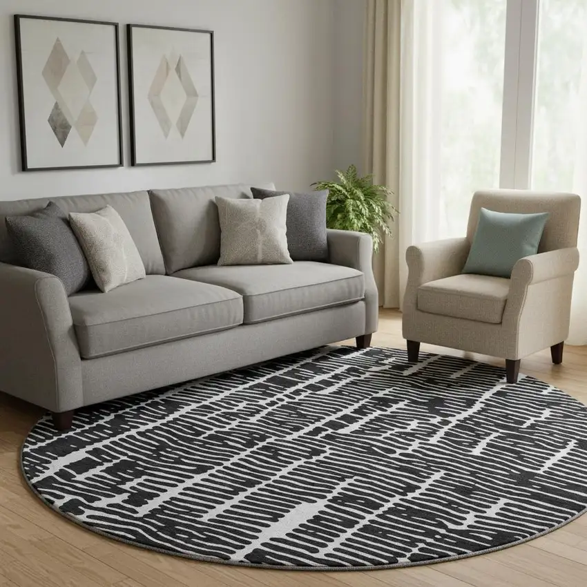 8' Black And Ivory Vermicular Washable Round Rug With UV Protection Photo 1