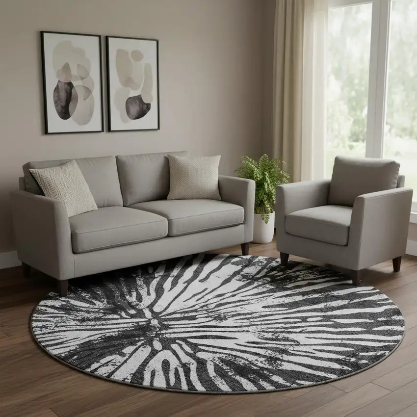 8' Black And Ivory Zebra Print Washable Round Rug With UV Protection Photo 1